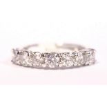 AN 18CT WHITE GOLD 7 STONE DIAMOND RING, 1.42ct diamonds