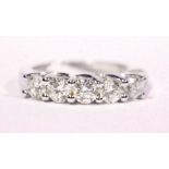 AN 18CT WHITE GOLD 5 STONE DIAMOND RING, with claw setting, 1.2ct diamonds