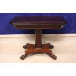 A VERY FINE IRISH, CORK, REGENCY MAHOGANY FOLD OVER TEA TABLE, with canted sides, raised on a