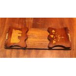 A KILLARNEY WARE BOOKENDS, book stand, with shaped ends having marquetry inlaid images of Muckross