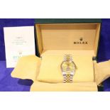 A GENTS ROLEX OYSTER PERPETUAL DATEJUST STEEL AND GOLD WATCH WITH FLUTED BEZEL, with certificate, in