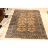 A SMALL FLOOR RUG, with main ground colour cream, 65" x 51" approx