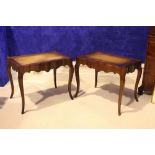 A PAIR OF CONTEMPORARY LEATHER TOPPED MAHOGANY LOW RISE TABLES, raised on cabriole leg, 27" x 17"