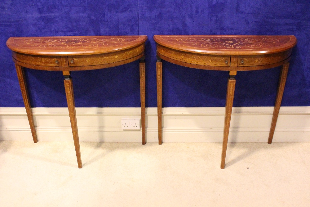 A VERY FINE PAIR OF LATE 19TH CENTURY CROSSBANDED ROSEWOOD DEMI LUNE CONSOLE TABLES, each with a