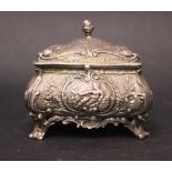 A DUTCH SILVER TRICKET BOX, with gilt interior, the body decorated all over with repoussé effect,