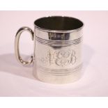 AN EARLY 20TH CENTURY SILVER CHRISTENING MUG, with reeded detail to the body, and engraved with