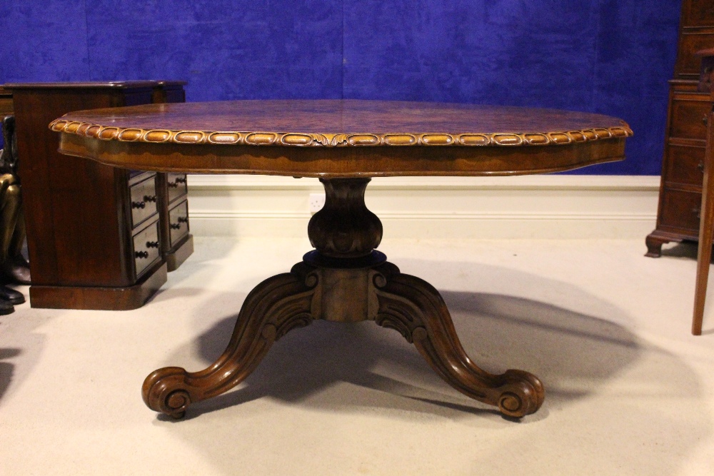 A VERY FINE 19TH CENTURY BURR WALNUT CENTRE / DINING 'FLIP TOP' TABLE, with gadrooned rim, raised on - Image 2 of 3