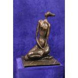 A CONTEMPORARY BRONZE SCULPTURE OF A LADY