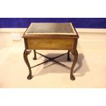 AN EDWARDIAN MAHOGANY & MARQUETRY INLAID LIFT TOP PIANO STOOL, raised on cabriole leg, united by