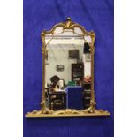 AN EARLY 20TH CENTURY GILTWOOD PIER GLASS / LOOKING MIRROR, with foliage motif to the frame &