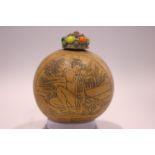 A JAPANESE SNUFF BOTTLE, bulbous in form, with images of a lady bathing on both sides, with