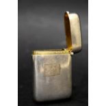 AN EARLY 20TH CENTURY SILVER VESTA CASE, small, with gilt interior, maker's mark A.C, and further