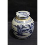A BLUE & WHITE GINGER JAR, with lid, images of a figure standing by water, with a landscape, in