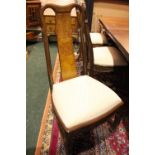A SET OF 10 DINING ROOM CHAIRS, 8 CHAIRS 2 CARVERS, oriental style decoration to the back