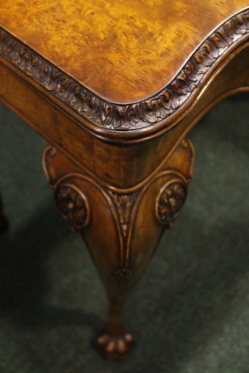 A VERY FINE WALNUT FOLD OVER CARD TABLE, with gadrooned rim of foliage detail, raised on cabriole - Image 3 of 3