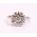 AN 18CT WHITE GOLD 7 STONE DIAMOND CLUSTER RING, 1.50cts diamonds