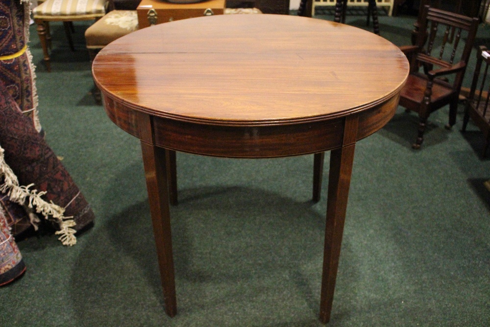 A GOOD QUALITY DEMI-LUNE FOLD OVER CARD TEA TABLE, with reeded rim, raised on tapered leg, having - Image 3 of 5