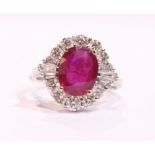 AN 18CT WHITE GOLD ART DECO STYLE RUBY AND DIAMOND RING, with round brilliant cut diamonds and