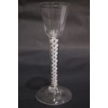 AN 18TH CENTURY DOUBLE OPAQUE TWIST STEM WINE GLASS, 6.75" tall approx, in excellent condition