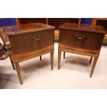 A PAIR OF WALNUT INLAID NIGHT STANDS / LOCKERS, with fall front doors having inlaid detail, raised
