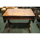 A DROP LEAF SOFA TABLE, with two frieze drawers, raised on a pair of side pod supports with