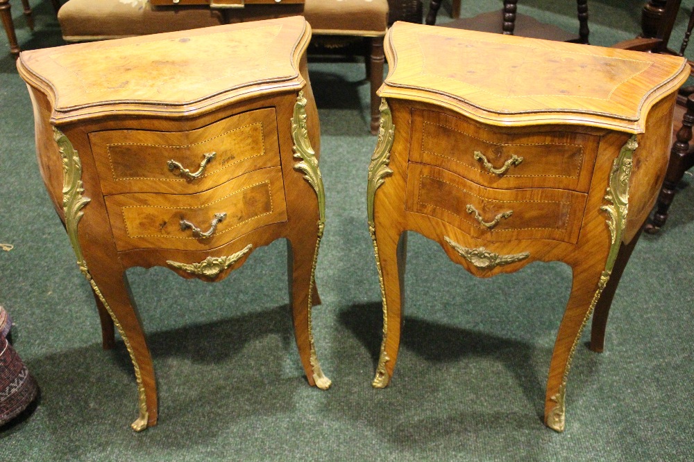 A PAIR OF MIXED WOOD FRENCH STYLE LOCKERS, each with two drawers, raised on cabriole shaped legs