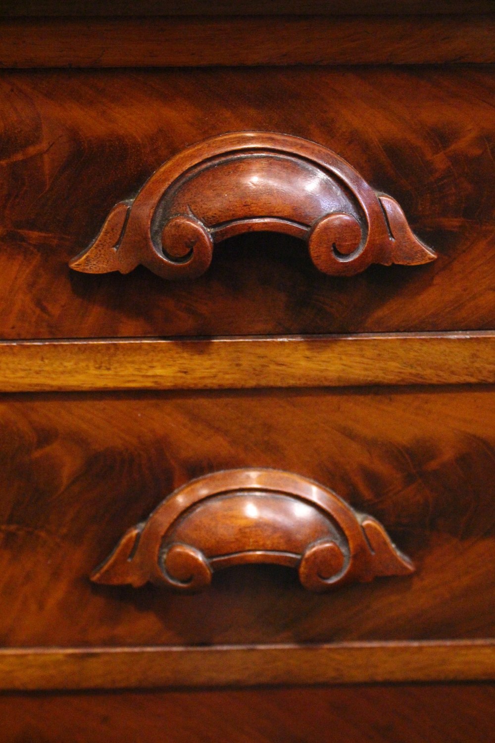 A PAIR OF VICTORIAN 5 DRAWER CHESTS, with carved pull handles, on platform base, graduated - Image 3 of 3