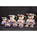 A WONDERFUL SET OF MASON’S IRONSTONE ‘HYDRA’ IMARI PATTERNED JUGS, each with hexagonal body shape,