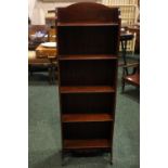 A NEAT SIZED FLOOR BOOKCASE, 5 shelves, raised gallery back, shaped skirt, 45" x 15" x 8" approx