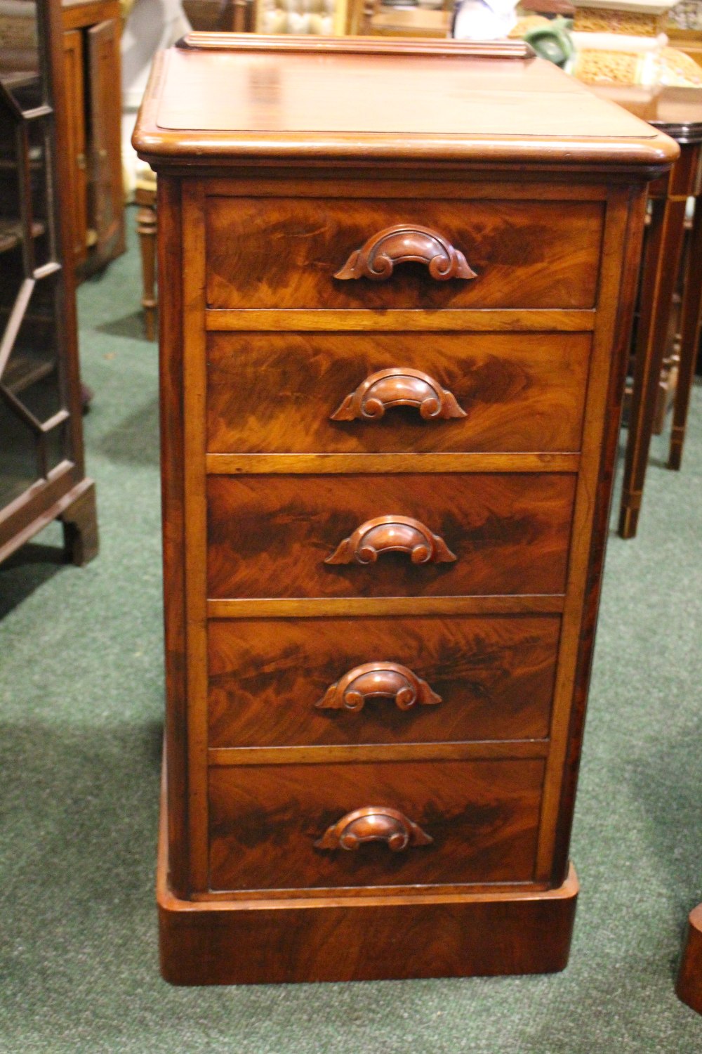 A PAIR OF VICTORIAN 5 DRAWER CHESTS, with carved pull handles, on platform base, graduated - Image 2 of 3