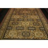 A LARGE FLOOR RUG, with geometric motif, in excellent condition, 140" x 98" approx