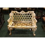 A VERY GOOD 'HORSESHOE' CAST IRON GARDEN CHAIR, with pierced seat, and back made of horseshoe motif,