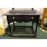 AN 18TH CENTURY, IRISH, CORK, EBONISED SIDE TABLE, with a single frieze drawer, raised on turned