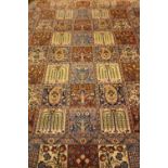 A VERY GOOD QUALITY QUM GARDEN FLOOR RUG, with central picture panels, 83" x 54" approx