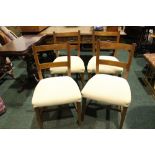 A SET OF 4 DINING ROOM CHAIRS, with curved back support, tapered leg united by H stretcher, in
