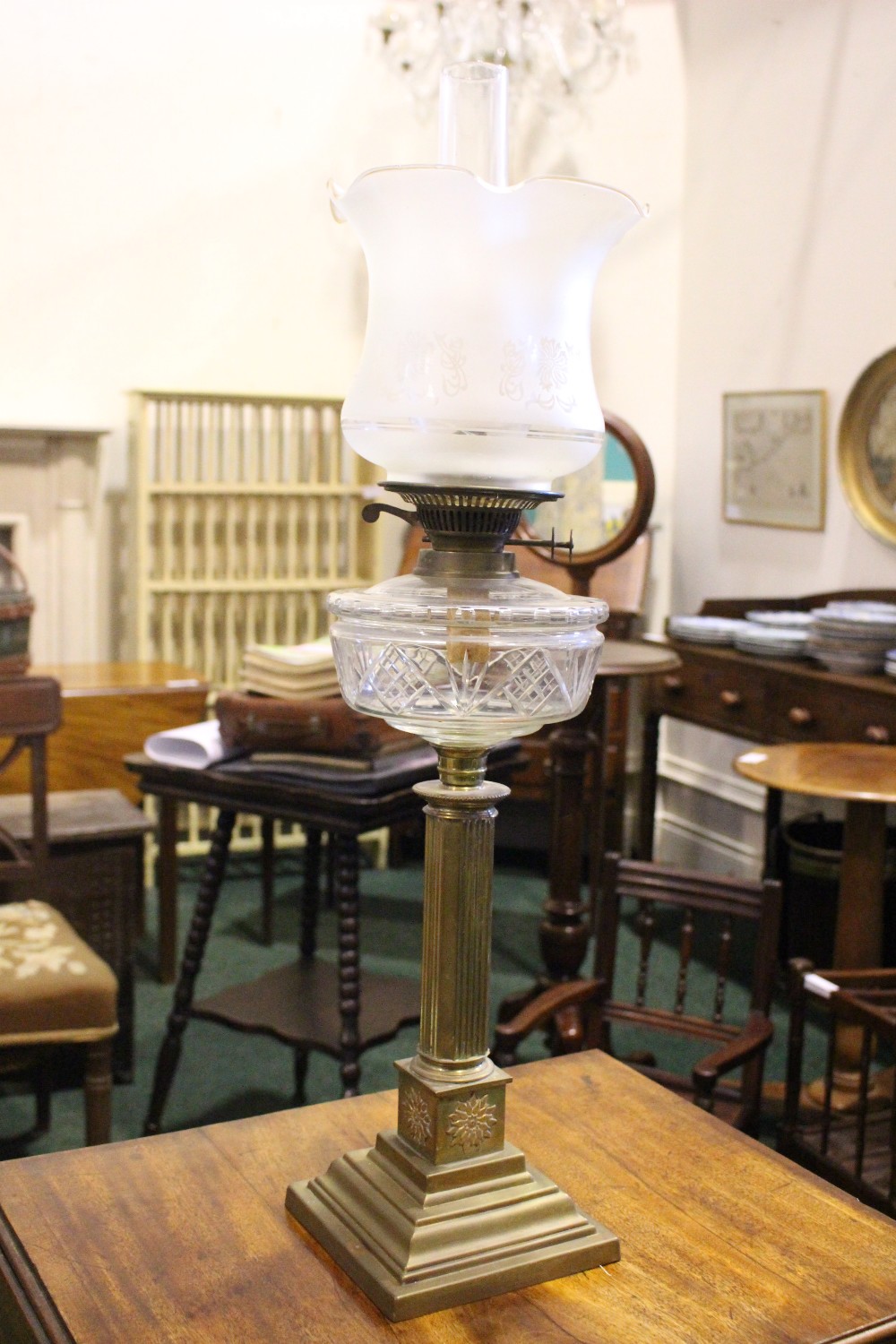 A VICTORIAN BRASS & GLASS OIL LAMP, with column base, clear glass reservoir, frosted glass shade & - Image 2 of 4