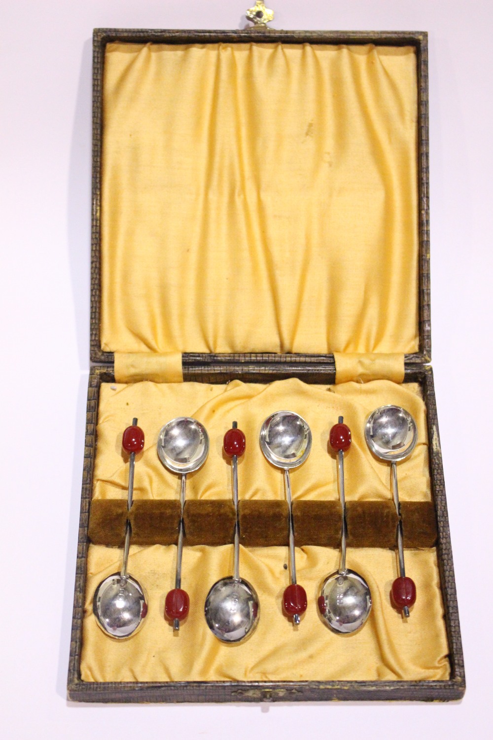 A CASED SET OF MID CENTURY SILVER COFFEE BEAN SPOONS, Birmingham, date letter 'K' for 1939, maker'