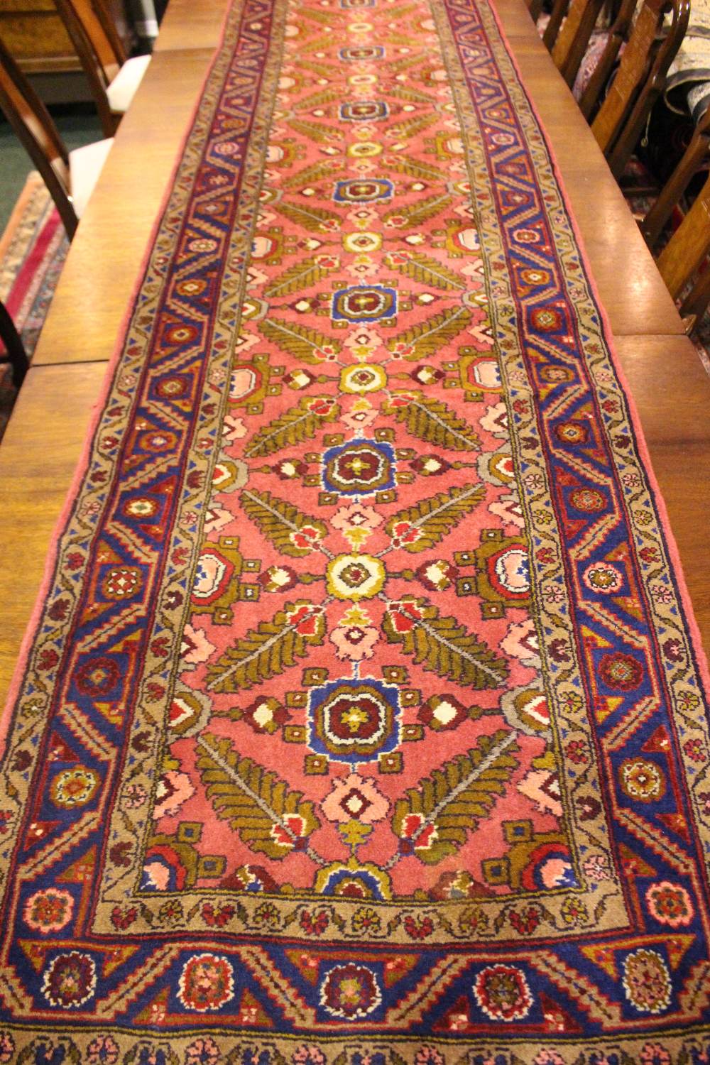 A VERY GOOD QUALITY HAMDAN FLOOR RUNNER, with foliage centre motif, multi border, 263" x 33" approx