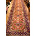 A VERY GOOD QUALITY HAMDAN FLOOR RUNNER, with foliage centre motif, multi border, 263" x 33" approx