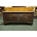 AN OAK COFFER CHEST / MARRIAGE CHEST, with carved initials to the front and a love heart motif to