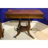 A VERY FINE REGENCY FOLD OVER CARD TABLE, with brass string inlaid detail to the top, horizontal