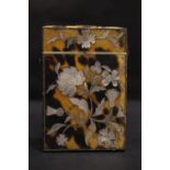A TORTOISESHELL CIGARETTE CASE / BOX, with engraved initial to the top, inlaid with floral mother of