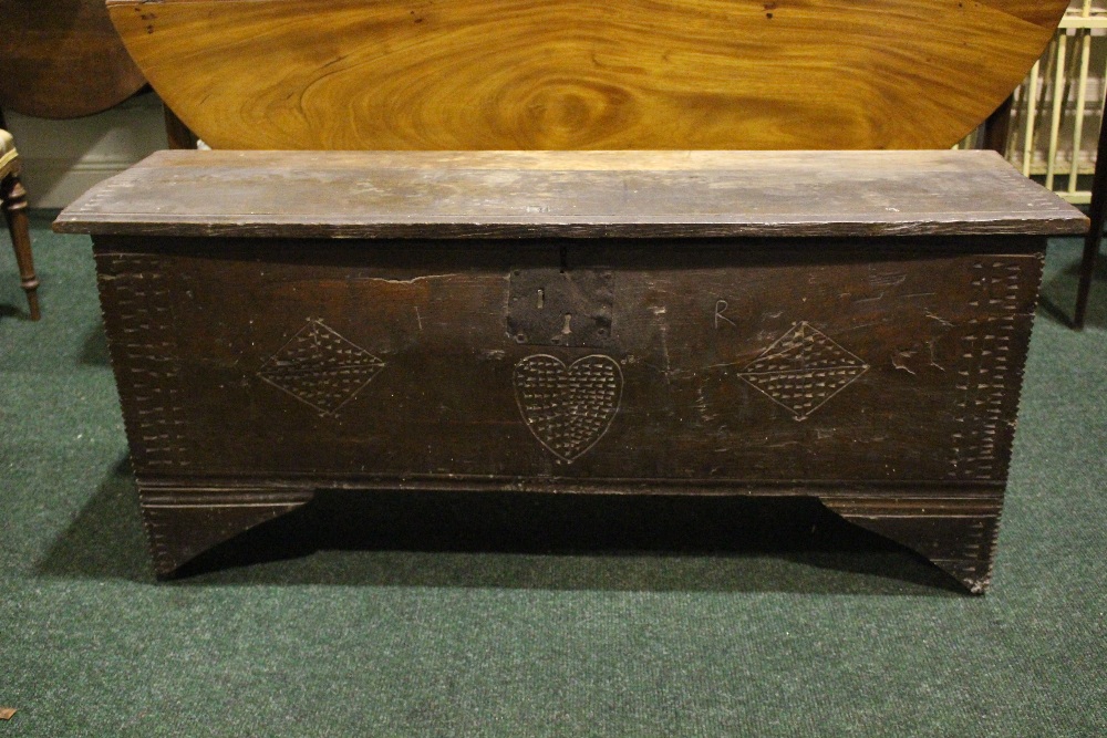 AN OAK COFFER CHEST / MARRIAGE CHEST, with carved initials to the front and a love heart motif to - Image 2 of 7