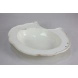 A Leeds Pottery creamware shaving bowl, oval shape with raised scalloped border and cutout recess,