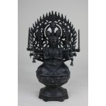 An Indian black metal figure of the goddess Durga, mark to base, 37cm