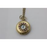 A lady's Swiss 18ct gold pocket watch with pink chapter ring on an oval link chain with bolt ring