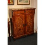 A French gilt marquetry inlaid gilt metal mounted cabinet with rectangular shaped marble top, frieze