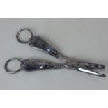 A pair of Edward VII silver grape scissors, makers Goldsmiths and Silversmiths Co, 1909, 4oz, 17cm