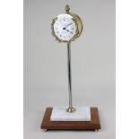 A limited edition gravity rack clock, the dial signed T. W. Bazeley, Clockmaker, Cheltenham, England