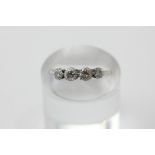 A diamond four stone ring in platinum